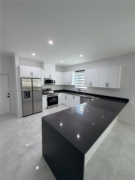 Furnished interior view inside a new home in , Lehigh Acres (Image 6).