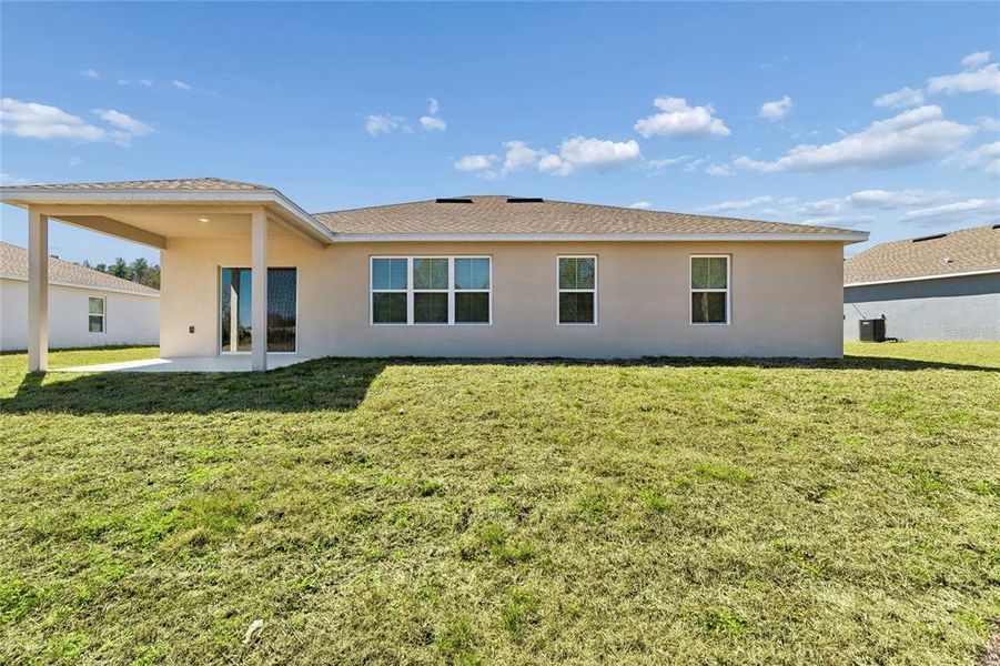 Exterior details and patio area of a home in Aspire at Glen Aire, Ocala (Image 3).
