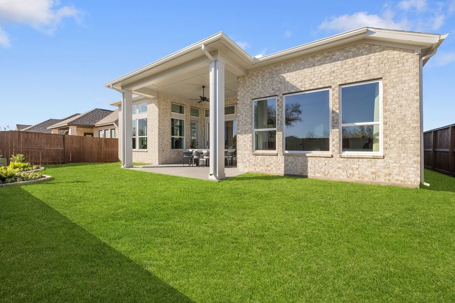 Representative exterior details of a home built from the The Begonia by David Weekley Homes in Meridiana 55' Homesites, Manvel (Image 4).