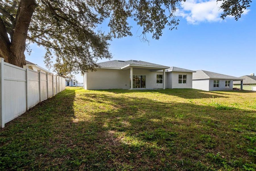 Exterior details and patio area of a home in SummerCrest, Ocala (Image 24).