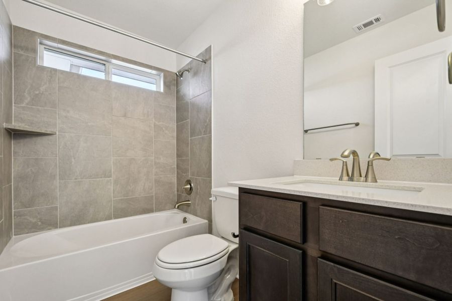 Furnished interior view inside a new home in Whisper Valley, Manor (Image 17).