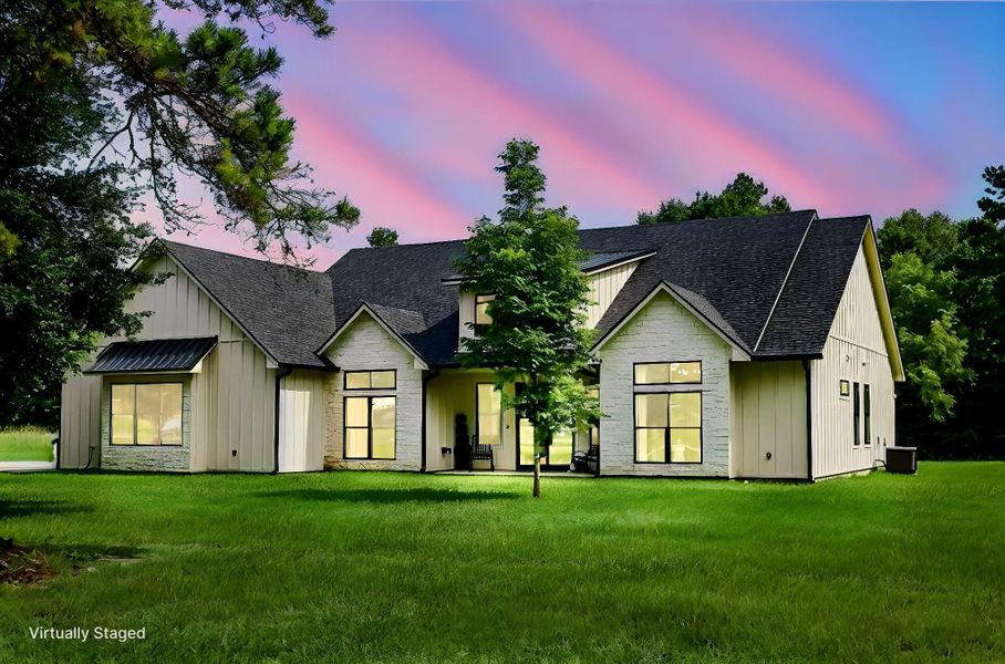 Front exterior of a new home in , Kennard, TX, highlighting curb appeal (Image 2). Front exterior of a new home in , Kennard, TX, highlighting curb appeal (Image 2).