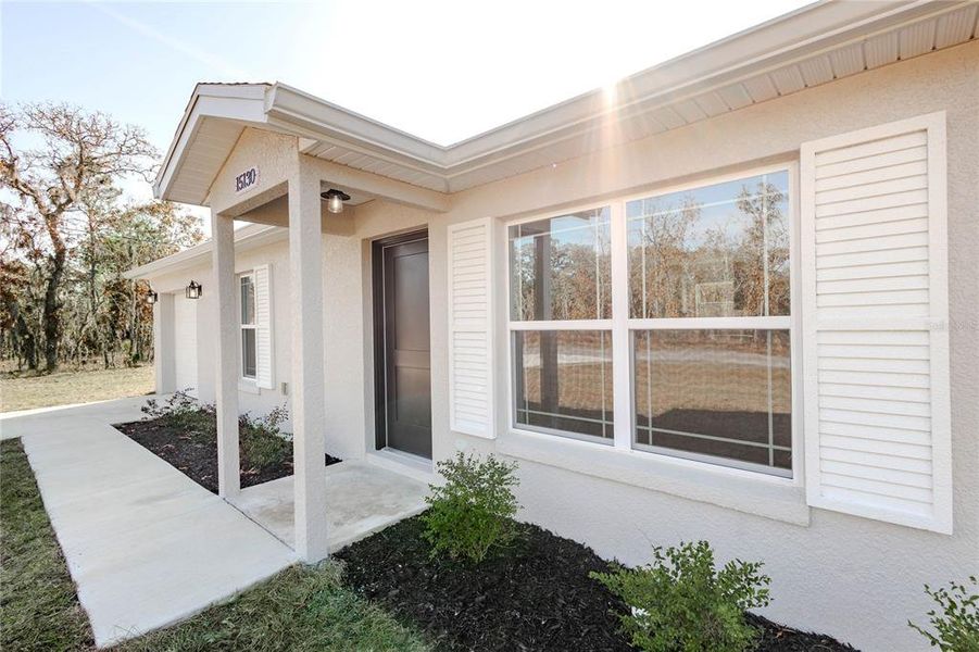 Exterior details and patio area of a home in , Williston (Image 16).