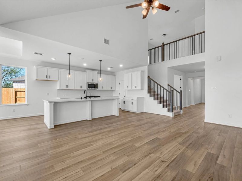 Gathering room. Sample product photo. Actual exterior and interior selections may vary by homesite. Photo may be virtually staged.