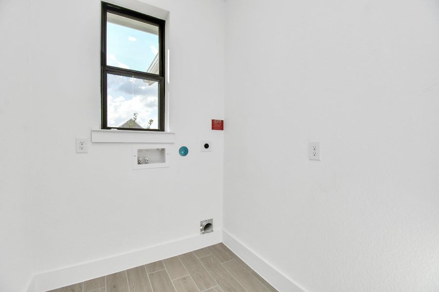 Spacious, unfurnished interior of a new home in Arabella on the Prairie: Signature Collection, Richmond (Image 22).