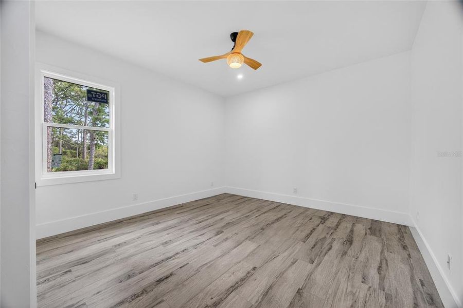 Spacious, unfurnished interior of a new home in , Port Charlotte (Image 36).