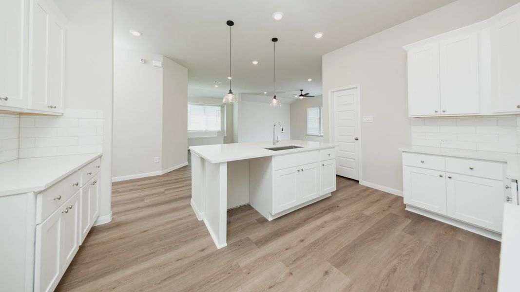 Kitchen to Dining Area and Family Room