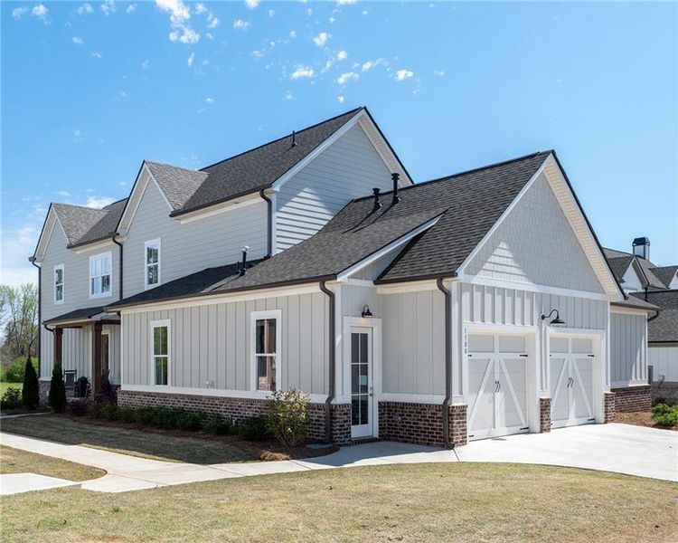 Front exterior of a new home in , Watkinsville, GA, highlighting curb appeal (Image 21).