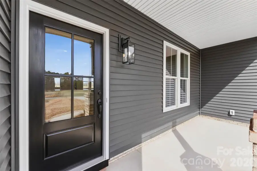 Exterior details and patio area of a home in , Locust (Image 3). Exterior details and patio area of a home in , Locust (Image 3).