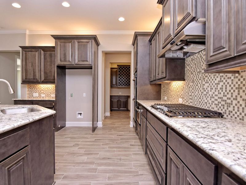 Representative furnished interior of a home built from the San Simeon I by Giddens Homes in Clearwater Ranch, Liberty Hill (Image 272).