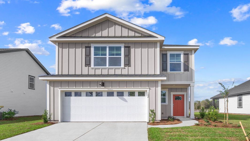 Representative exterior photo of a completed home built from the Manning by D.R. Horton in Rice Hope, Port Wentworth, GA (Image 2).
