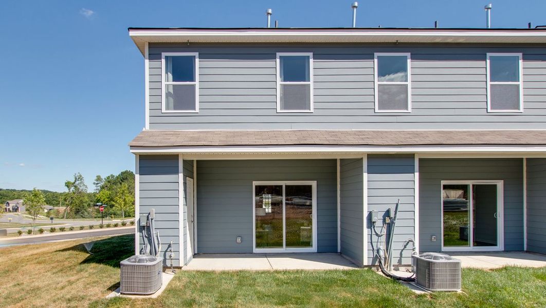 Representative exterior photo of a completed home built from the FRANKLIN by D.R. Horton in Woodbridge Glen Townhomes, Lebanon, TN (Image 19).