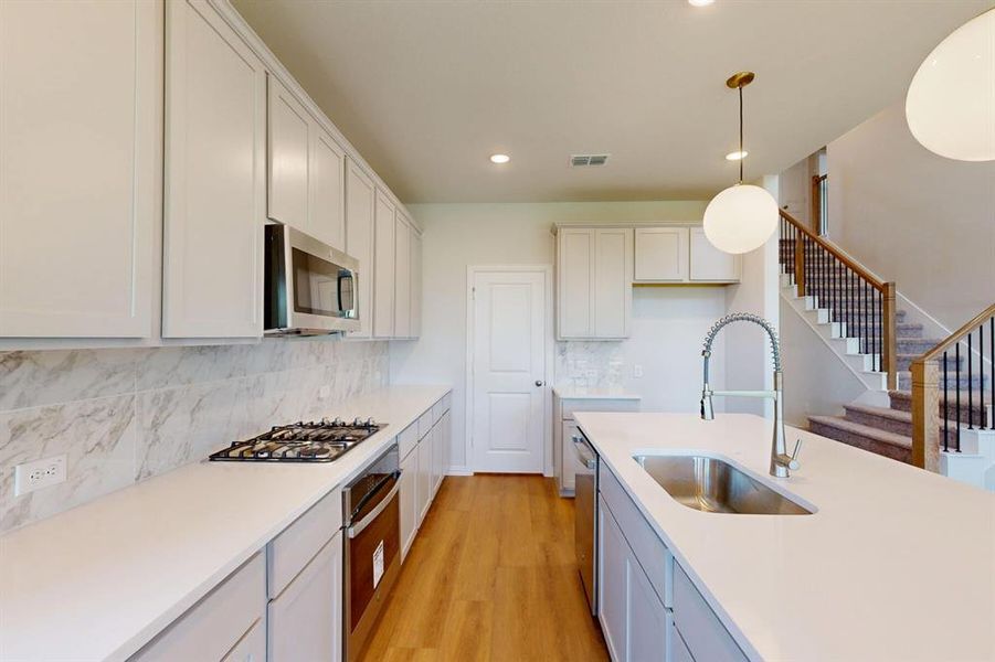 Furnished interior view inside a new home in Lilybrooke at Legacy Hills, Celina (Image 9).