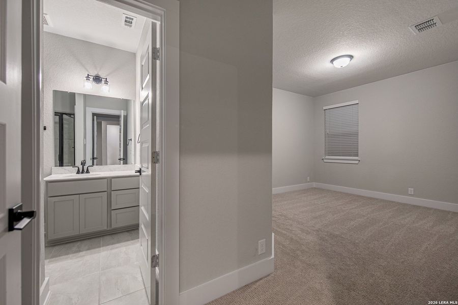 Spacious, unfurnished interior of a new home in The Reserve at Potranco Oaks, Castroville (Image 22).