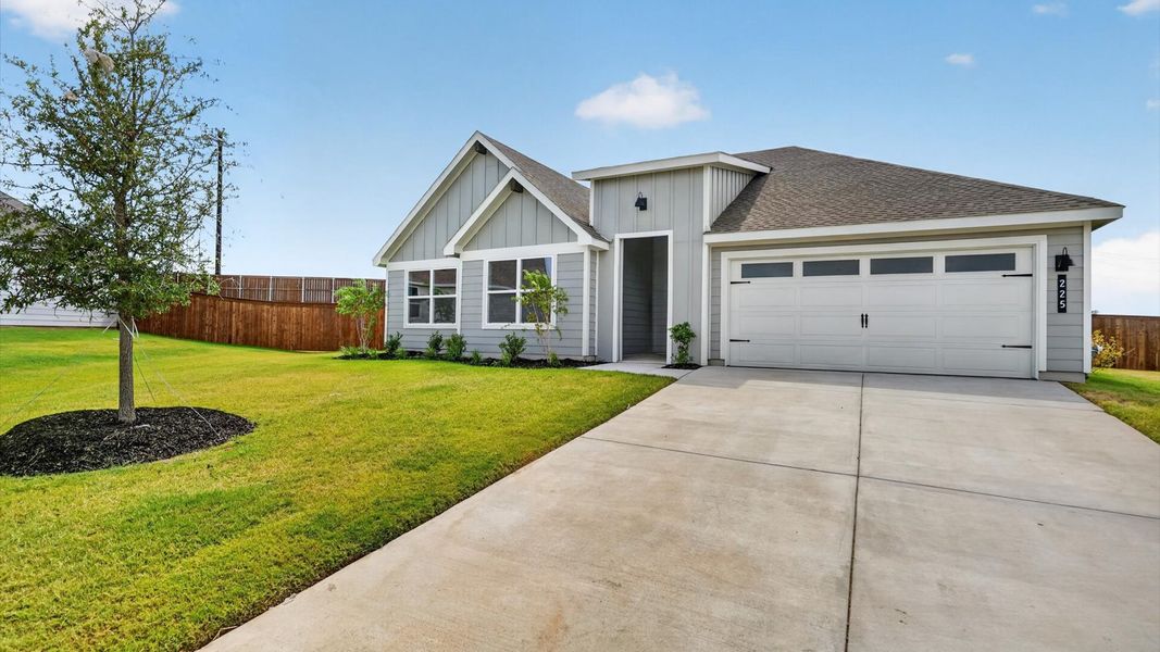 Front exterior of a new home in Sandstone Estates, Granbury, TX, highlighting curb appeal (Image 17).
