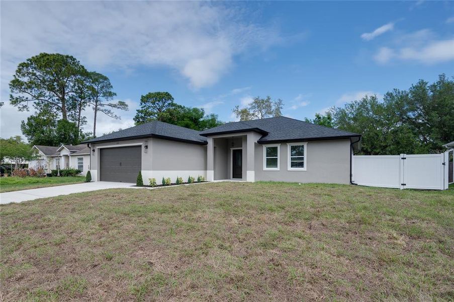Front exterior of a new home in , Debary, FL, highlighting curb appeal (Image 23).