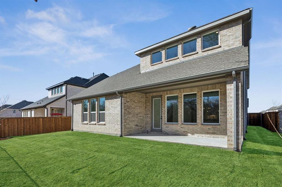 Whether you are dining al fresco on the covered back patio or romping with the kids in the yard, this private fenced back yard is the perfect place to enjoy the great outdoors! Whether you are dining al fresco on the covered back patio or romping with the kids in the yard, this private fenced back yard is the perfect place to enjoy the great outdoors!