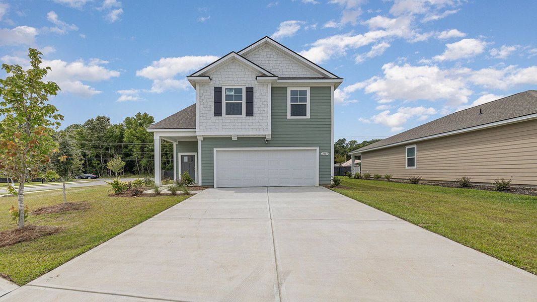 Front exterior of a new home in Auberon Woods, Conway, SC, highlighting curb appeal (Image 1).