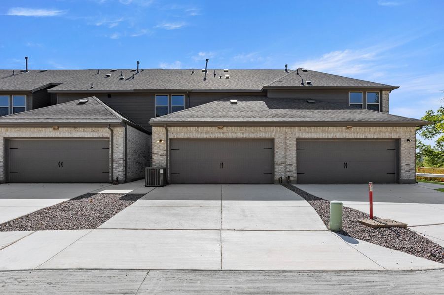 Front exterior of a new home in Timber Ridge, Corinth, TX, highlighting curb appeal (Image 27). Front exterior of a new home in Timber Ridge, Corinth, TX, highlighting curb appeal (Image 27).