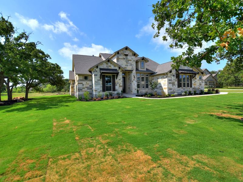 Representative exterior photo of a completed home built from the San Simeon I by Giddens Homes in Clearwater Ranch, Liberty Hill, TX (Image 40).