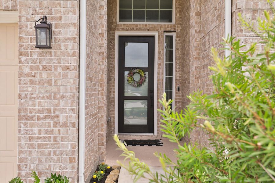 Step into your new home through an elegant 8' Mahogany front door, setting the tone for the comfort and style that awaits inside. Step into your new home through an elegant 8' Mahogany front door, setting the tone for the comfort and style that awaits inside.