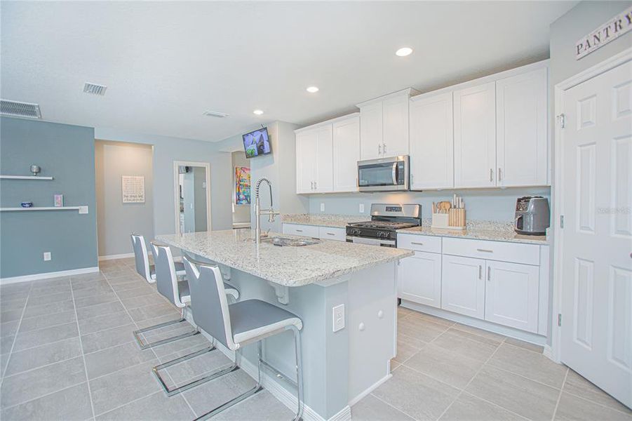 Furnished interior view inside a new home in The Reserve at Twin Lakes, St. Cloud (Image 7).