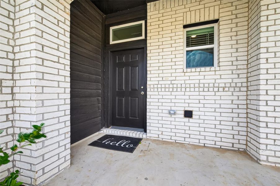 Exterior details and patio area of a home in Sunterra, Katy (Image 4).