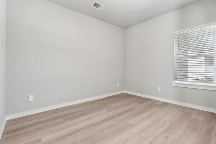 Spacious, unfurnished interior of a new home in Landing Meadows - Traditional Series, New Caney (Image 15).