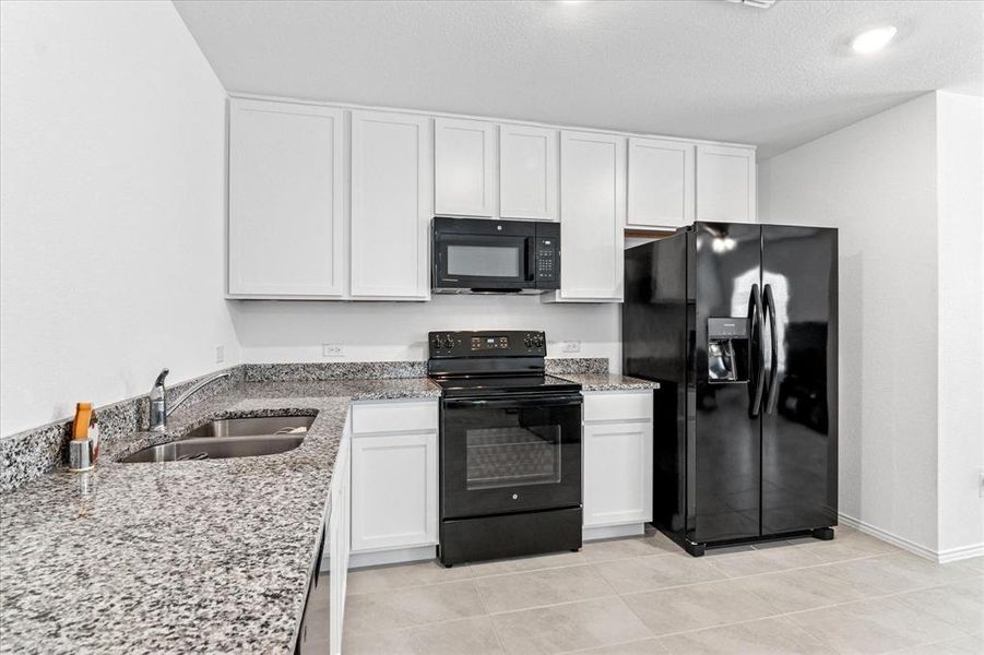 Granite Counters & Lots of Cabinets + Pantry