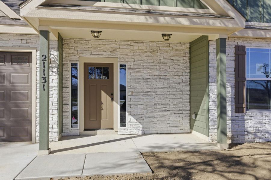Exterior details and patio area of a home in Lonesome Dove, San Antonio (Image 3).