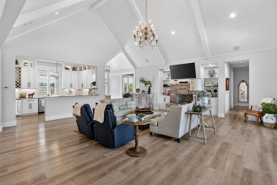 Notice the entertaining area just beyond the grand living space. This creates the perfect set-up for your next gathering.