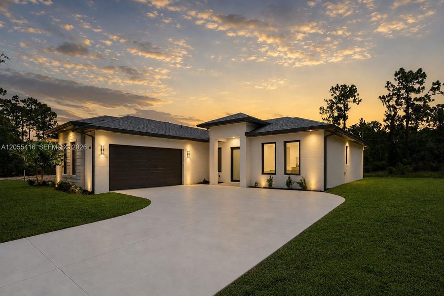 Front exterior of a new home in , Sebring, FL, highlighting curb appeal (Image 2). Front exterior of a new home in , Sebring, FL, highlighting curb appeal (Image 2).