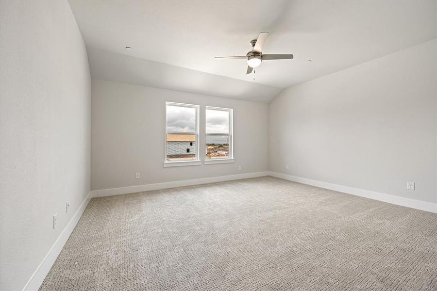 With high ceilings, oversized windows and a neutral color palette, this owner's suite is a peaceful retreat where you can rest and renew at the end of the day!