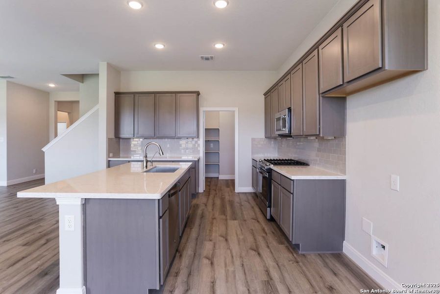 Furnished interior view inside a new home in Buffalo Crossing – New Phase Now Preselling, Cibolo (Image 4).