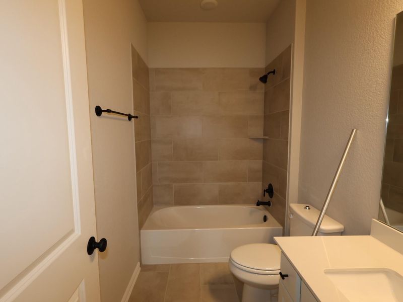 Furnished interior view inside a new home in Heritage, Dripping Springs (Image 5).