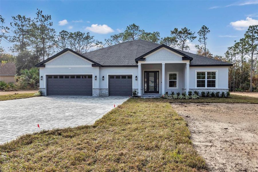 Front exterior of a new home in , Beverly Hills, FL, highlighting curb appeal (Image 23). Front exterior of a new home in , Beverly Hills, FL, highlighting curb appeal (Image 23).