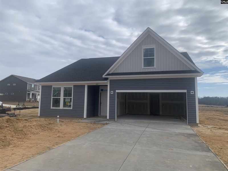 Front exterior of a new home in Peachtree Hills, Lexington, SC, highlighting curb appeal (Image 2). Front exterior of a new home in Peachtree Hills, Lexington, SC, highlighting curb appeal (Image 2).