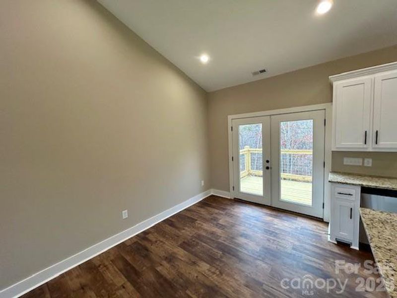 Dining Room with vaulted ceiling