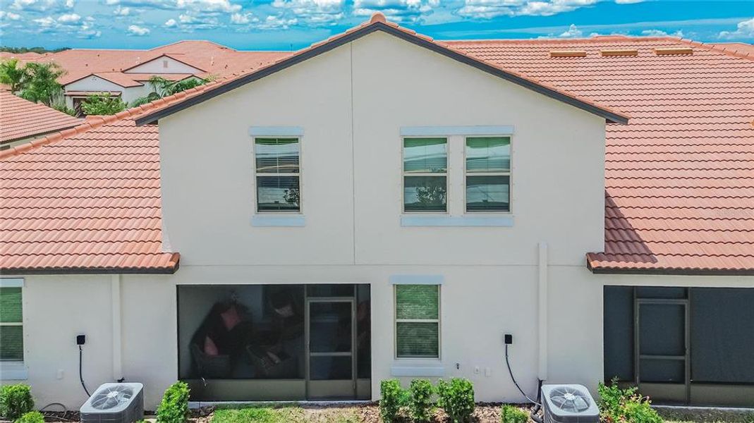 Exterior details and patio area of a home in Southshore Bay Active Adult, Wimauma (Image 32).