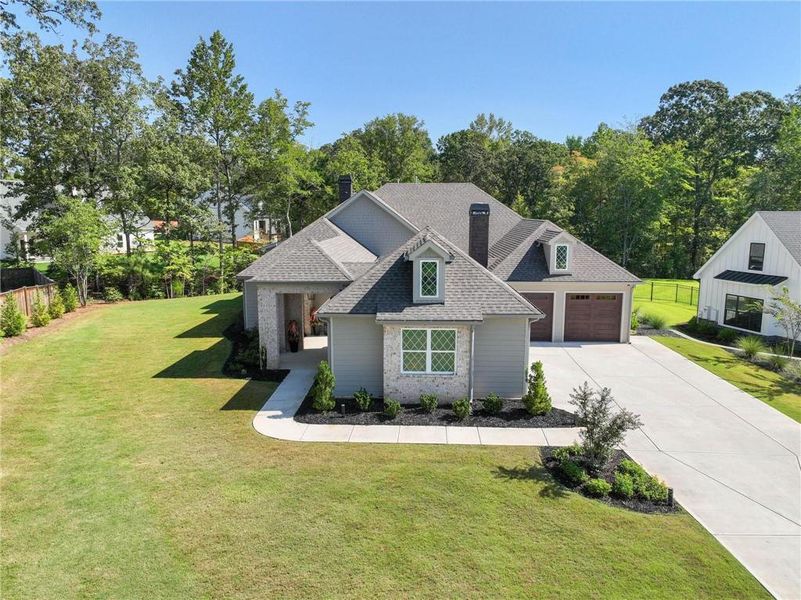 Front exterior of a new home in , Newnan, GA, highlighting curb appeal (Image 24).