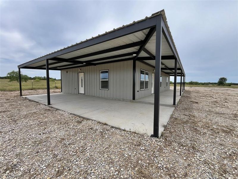Exterior details and patio area of a home in , Mineral Wells (Image 17).