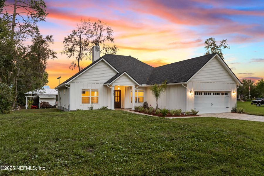 Front exterior of a new home in , Florahome, FL, highlighting curb appeal (Image 27).