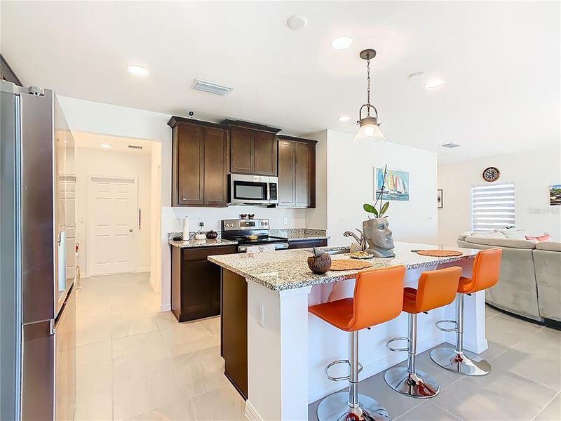 Furnished interior view inside a new home in Horse Creek at Crosswinds, Davenport (Image 29).
