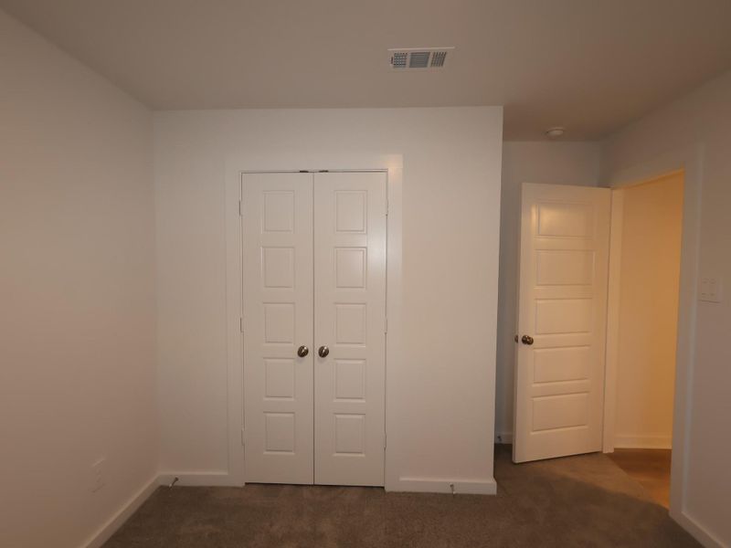 Spacious, unfurnished interior of a new home in Pinewood at Grand Texas, New Caney (Image 28).