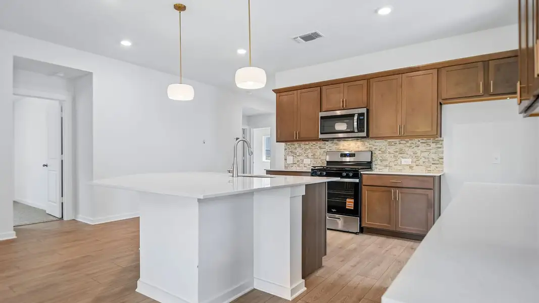 Furnished interior view inside a new home in Trails at Wildhorse, Austin (Image 11).