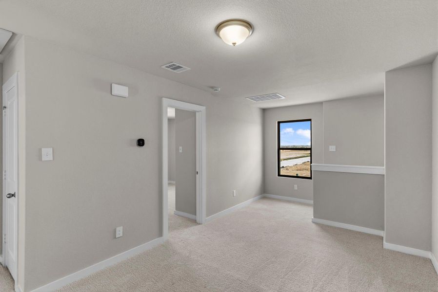 Spacious, unfurnished interior of a new home in Windrose Green, Angleton (Image 27).
