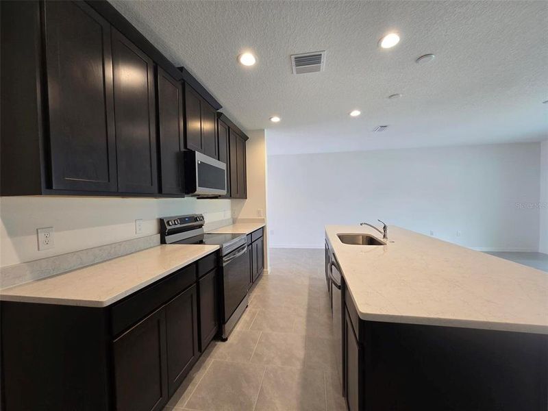 Furnished interior view inside a new home in Sky Lakes Estates, St. Cloud (Image 5).