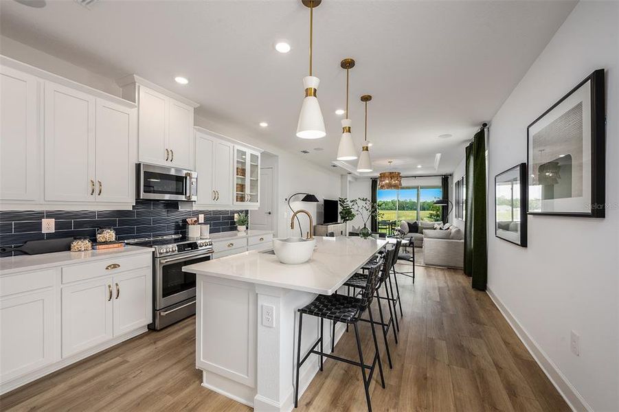 Furnished interior view inside a new home in Esplanade at Wellen Park, Englewood (Image 7).