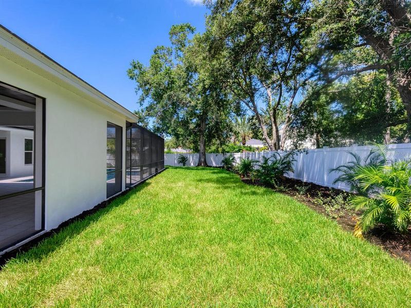 Front exterior of a new home in , Sarasota, FL, highlighting curb appeal (Image 34).