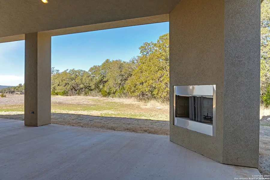 Exterior details and patio area of a home in , Spring Branch (Image 3).